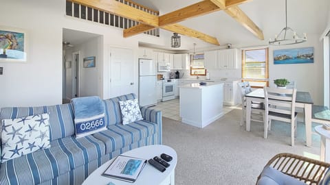 Open and bright main living area with vaulted ceiling