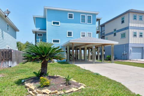 Coastal home featuring elevated design and covered parking in a peaceful location.
