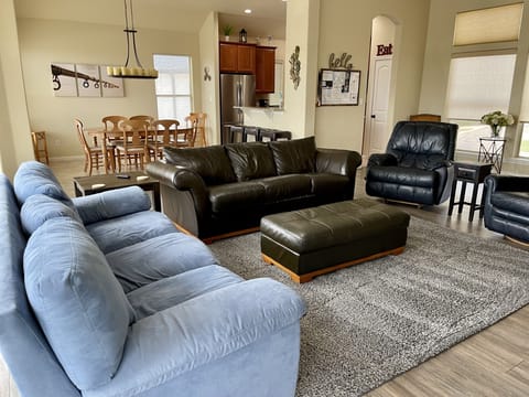 Living & dining room, message board and kitchen view.  Spacious 2100 Sq Ft home.