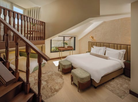 Family Suite | Premium bedding, minibar, in-room safe, desk