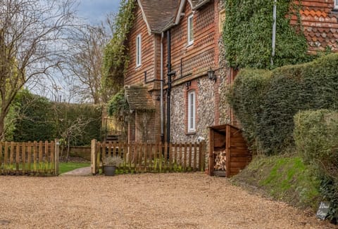 1 Church Cottages has gravel parking area for up to four cars