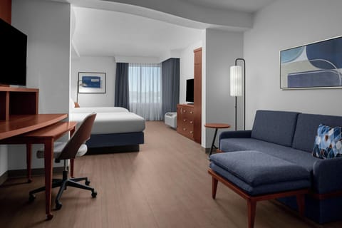 Studio, Multiple Beds | Living area | 32-inch flat-screen TV with cable channels, TV