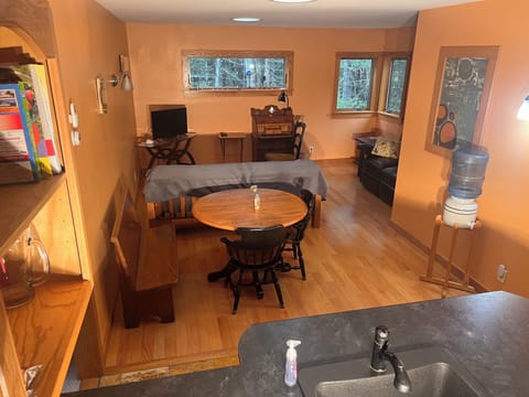 VIEW FROM KITCHEN TOWARDS DINING AND LIVING AREAS