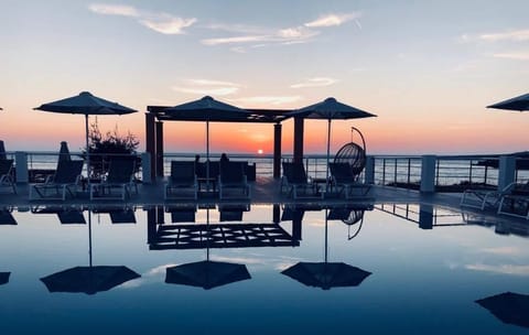 Seasonal outdoor pool, pool umbrellas, sun loungers