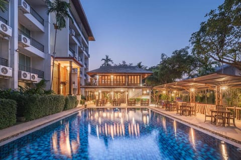 Outdoor pool, open 6:00 AM to 10:00 PM, free cabanas, pool umbrellas