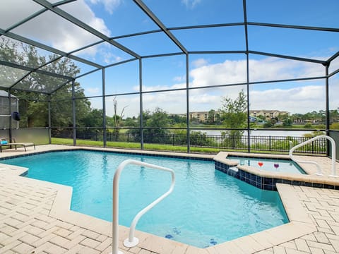 Relaxing  Lakeview pool with hand- rails