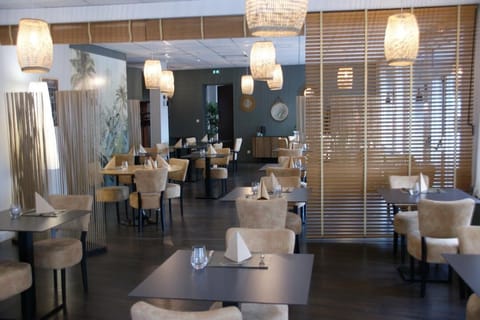 Breakfast, lunch, dinner served; local cuisine 