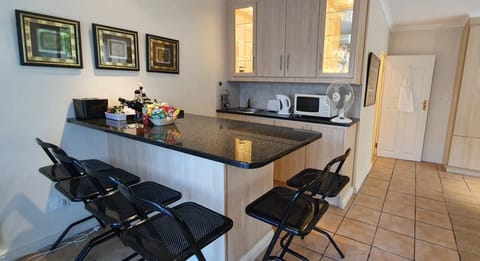 Garden Room | Private kitchen | Fridge, microwave, coffee/tea maker, cookware/dishes/utensils