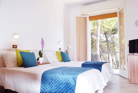 Superior Quadruple Room | Premium bedding, down comforters, desk, blackout drapes