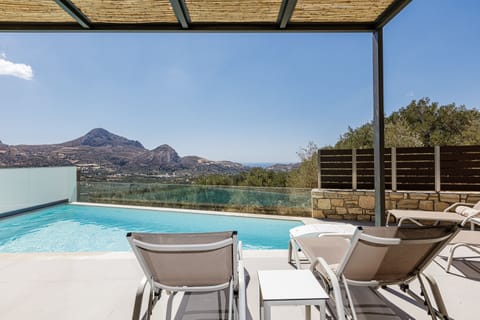 Pool terrace is equipped with six sun beds, sun umbrella and an outdoor shower