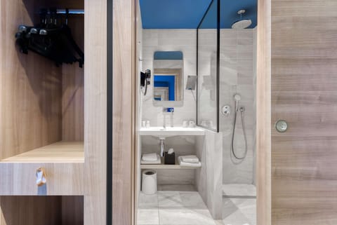 Eco-friendly toiletries, hair dryer, towels