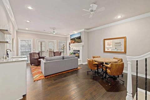 Venture downstairs to our SECOND living room, complete with a wet bar, a variety of board games, and a game table.