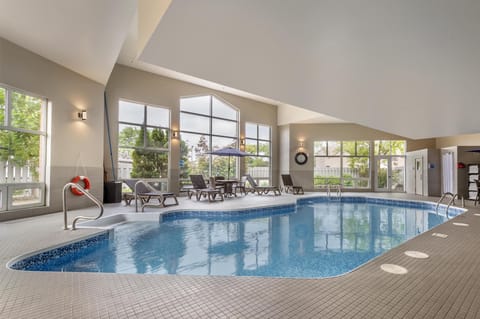 Indoor pool, open 9:00 AM to 9:00 PM, sun loungers