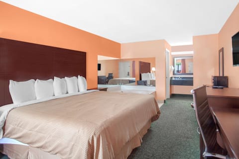 Suite, 1 King Bed, Non Smoking | In-room safe, desk, iron/ironing board, rollaway beds