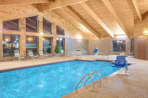 Indoor pool, open 10:00 AM to 10:00 PM, sun loungers