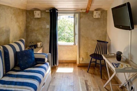 Suite | Premium bedding, individually decorated, desk, blackout drapes