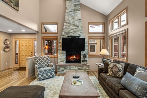 Gorgeous stacked stone fireplace to warm up on chilly nights!