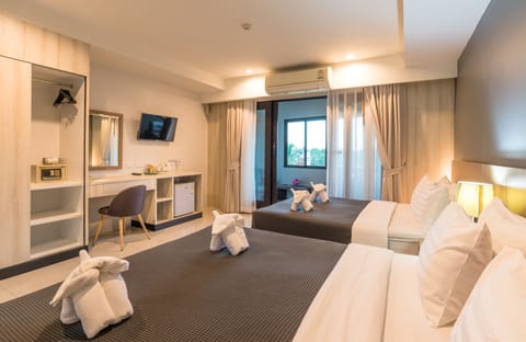 Deluxe Quadruple Room, Balcony | Free minibar, in-room safe, desk, rollaway beds