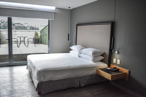 Suite, 1 King Bed, Non Smoking, Terrace | Down comforters, memory foam beds, in-room safe, individually furnished