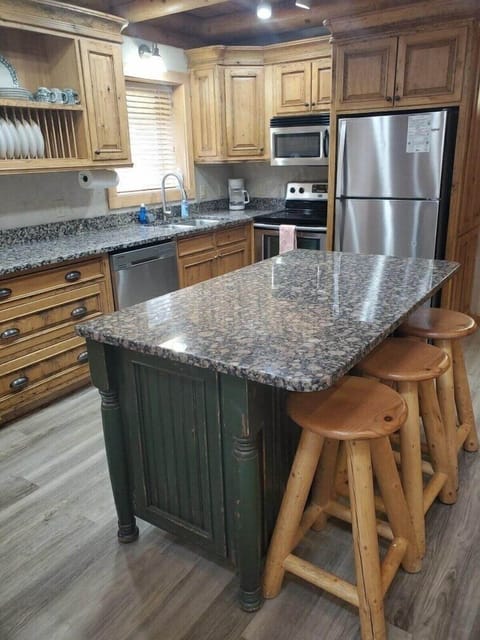 The kitchen is open and inviting with plenty of meal prep area.