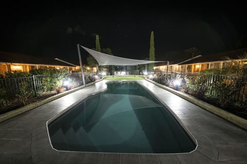 Outdoor pool, open 7:00 AM to 9:00 PM, pool umbrellas, sun loungers