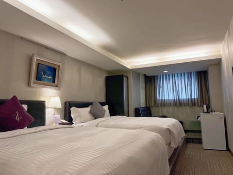 Superior Quadruple Room | Down comforters, pillowtop beds, individually decorated, desk