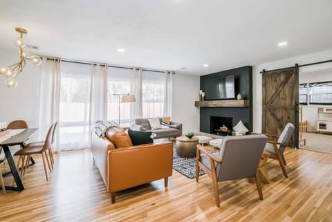 Large living room with 60" Smart TV (with Netflix, Hulu, Disney +, ESPN + and Fubo TV)