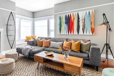 Welcome home, this bright, cheery, cozy living room awaits you.