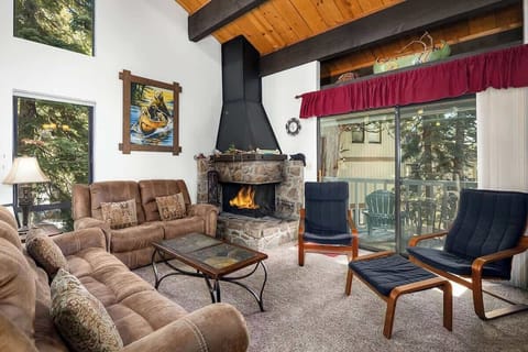 Living Room with Fireplace and Access to Upper Deck