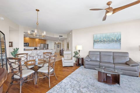 The huge windows provide beautiful natural light, and the dining table is perfect for sharing meals, catching up on work or homework, or playing a game or puzzle after dinner.