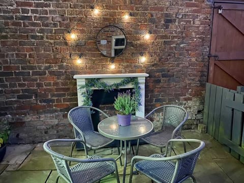 Outside courtyard with fetoon lights, perfect for an evening glass of wine