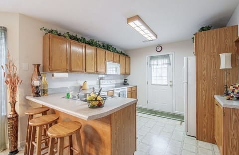 Kitchen equipped with Coffee Maker, Blender, Magic Bullet, & Crockpot.