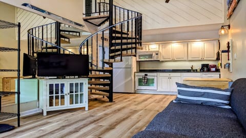 Open concept. Check out the spiral staircase 