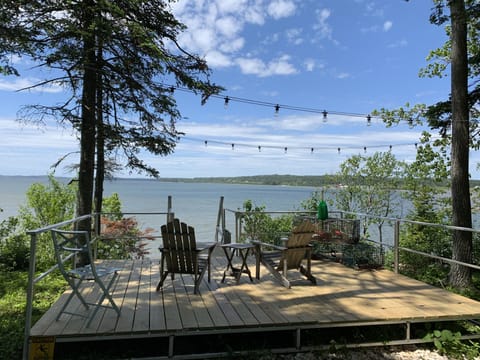One of 3 deck areas overlooking the bay; Stairs leading to private bay access