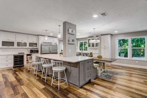 Kitchen with Huge Island, Beautiful Granite Countertops, Stainless Steel Appliances, Two Dishwashers, Double Oven, Double Refrigerator, Coffee Bar and Sitting Area