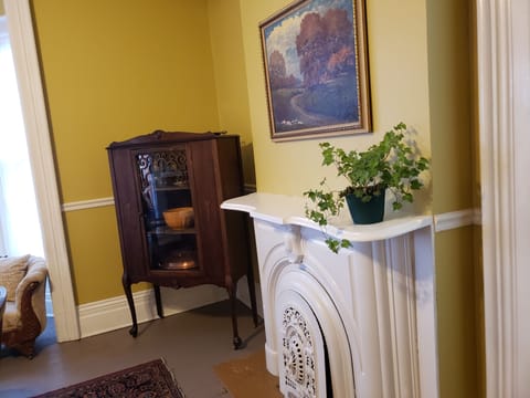 Dining Room has antique cabinet with wine glasses special occasion items
