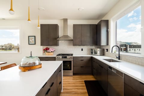 Full kitchen with great natural lighting.