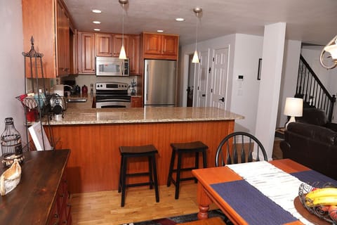 Full amenity kitchen with walk-in pantry and stainless-steel appliances
