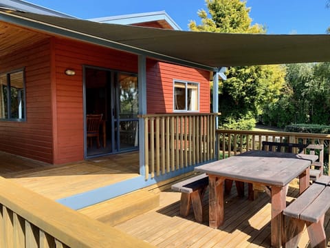 Large outdoor deck with shade cloth 