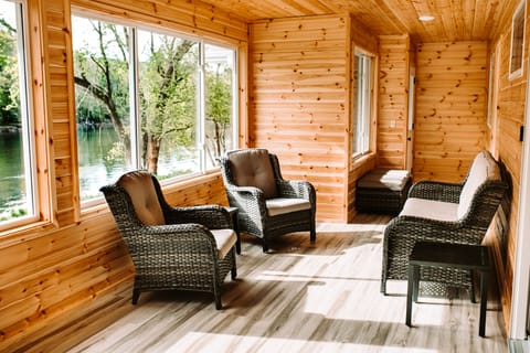Climate controlled sunroom with beautiful view of the White River. 