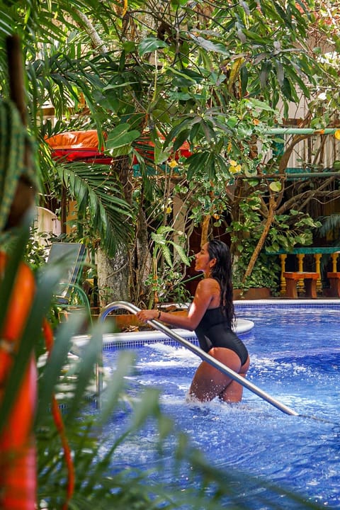 4 outdoor pools, open 8:00 AM to 10:00 PM, pool umbrellas, sun loungers