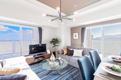 Apartment, Non Smoking | Living area | Flat-screen TV