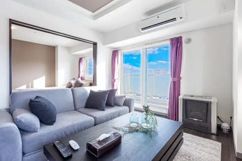 Apartment, Non Smoking | Living area | Flat-screen TV