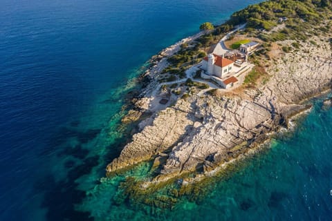 The view of estate of Vis Croatia luxury private holiday villa Lighthouse Ligero by the sea with jacuzzi.