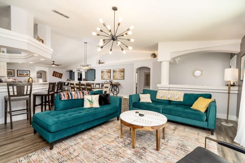 Our happy space - large classic couches and beautiful views of the palms and mt