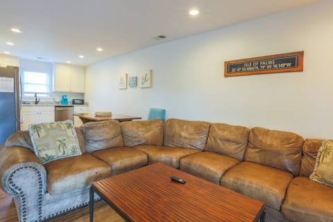 There's an open floor plan layout between the kitchen, dining and living room areas.