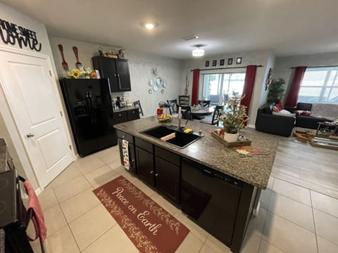 Open concept kitchen, dining room, living room