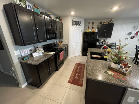 Fully stocked, modern kitchen