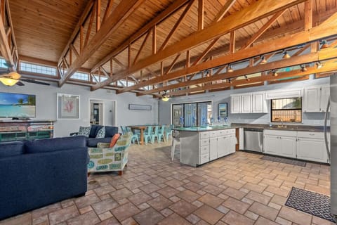 Spacious kitchen - fully-stocked & well-appointed for your stay. Stainless steel appliances and breakfast bar seats 6.