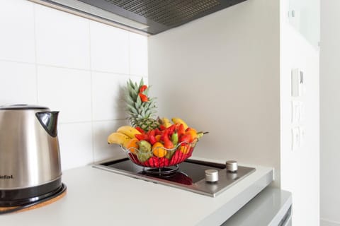 Fridge, microwave, electric kettle, cookware/dishes/utensils